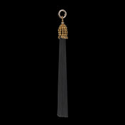 polyester beaded tassel by object and dawn in black background