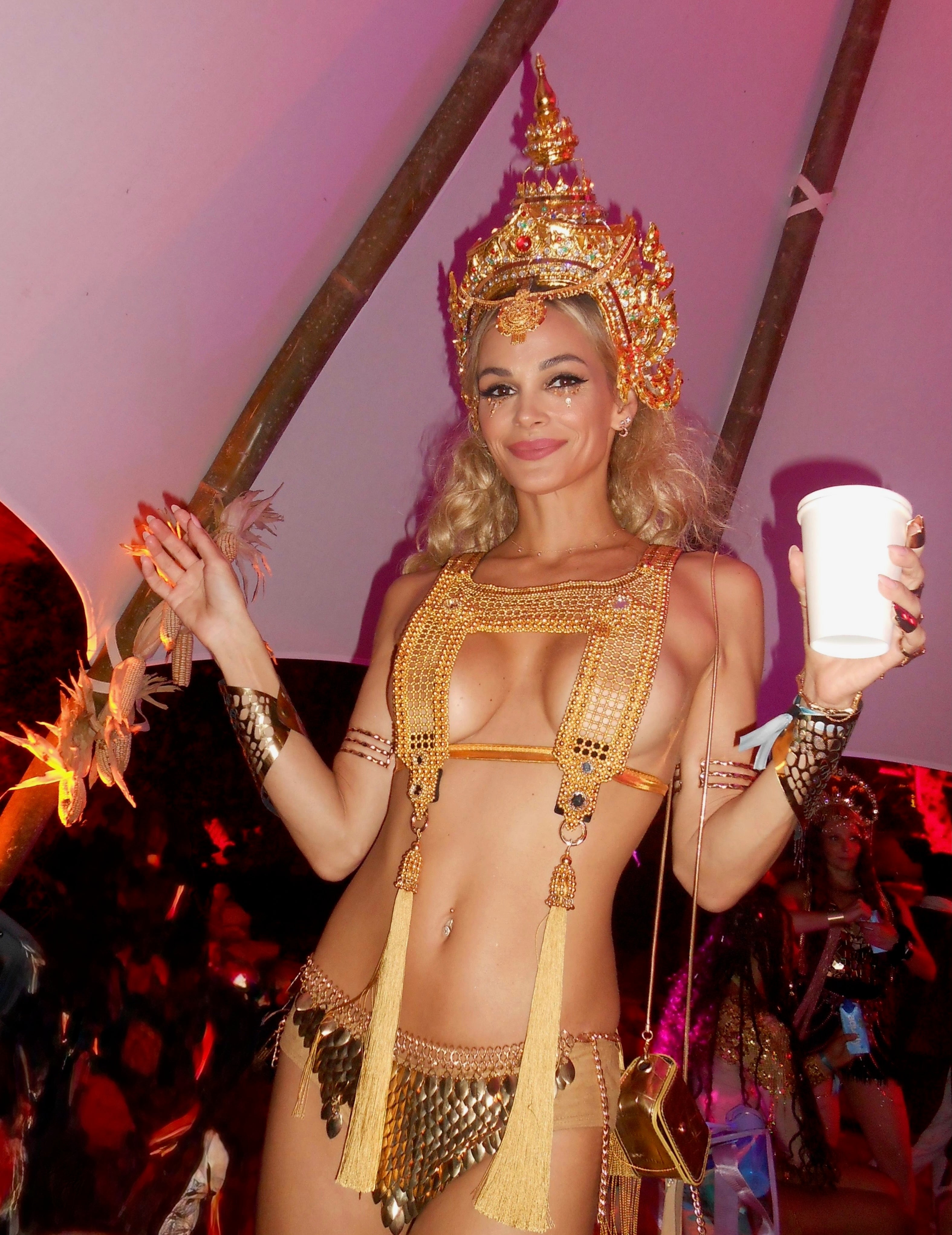 woman with blonde hair wear intricate mesh top harness featuring gold wash beads on a structured luxury by object & dawn