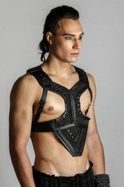 Men wears beaded modular Adonis Men's Leather Harness with khutulun cuff jet black
