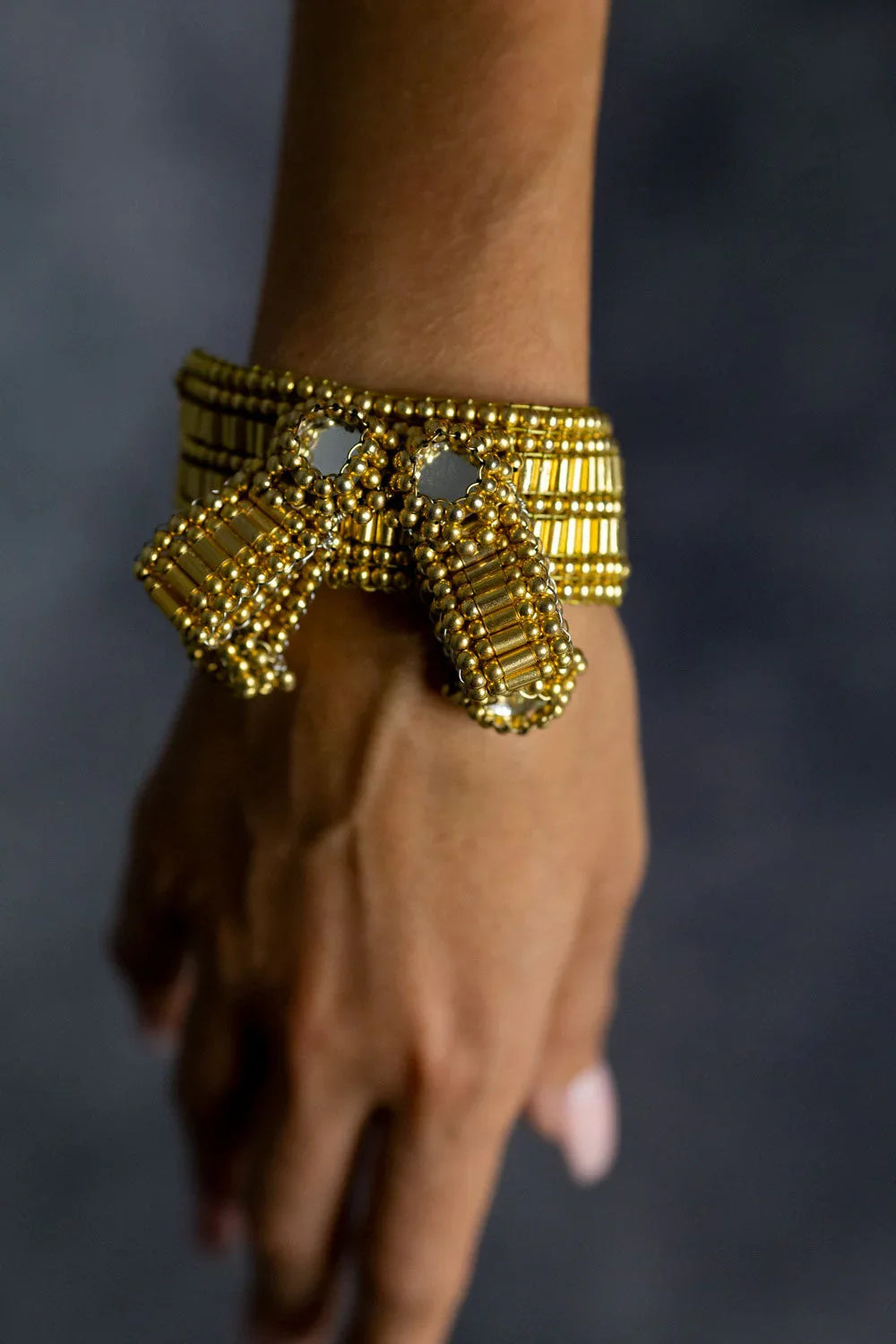 Object & Dawn ghost images of Amaya Bow band 22k gold wash close up view ghost image