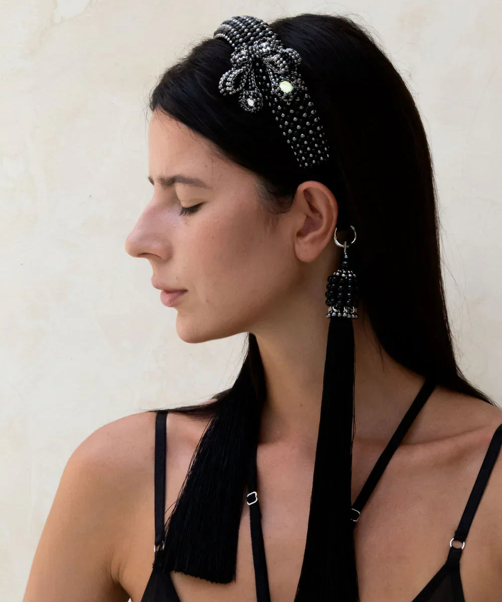 woman showing side view of Silver beaded with black crystals Teuta headband by Object & Dawn worn by a person with a neutral background