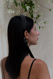 woman  with handcrafted Silver beaded  with black crystals amaya headband  by Object & Dawn worn by a person with a neutral background back view