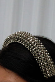 Object & Dawn Anais Headband in silver on woman in grey back ground, close up 