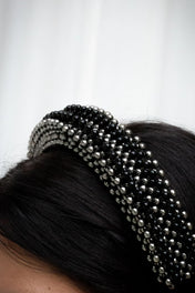 Object & Dawn Anais Headband jet black detail view worn by woman in neutral background