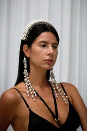 woman in black outfit wear Anais Headband in pearl with trinity medalions by object & Dawn