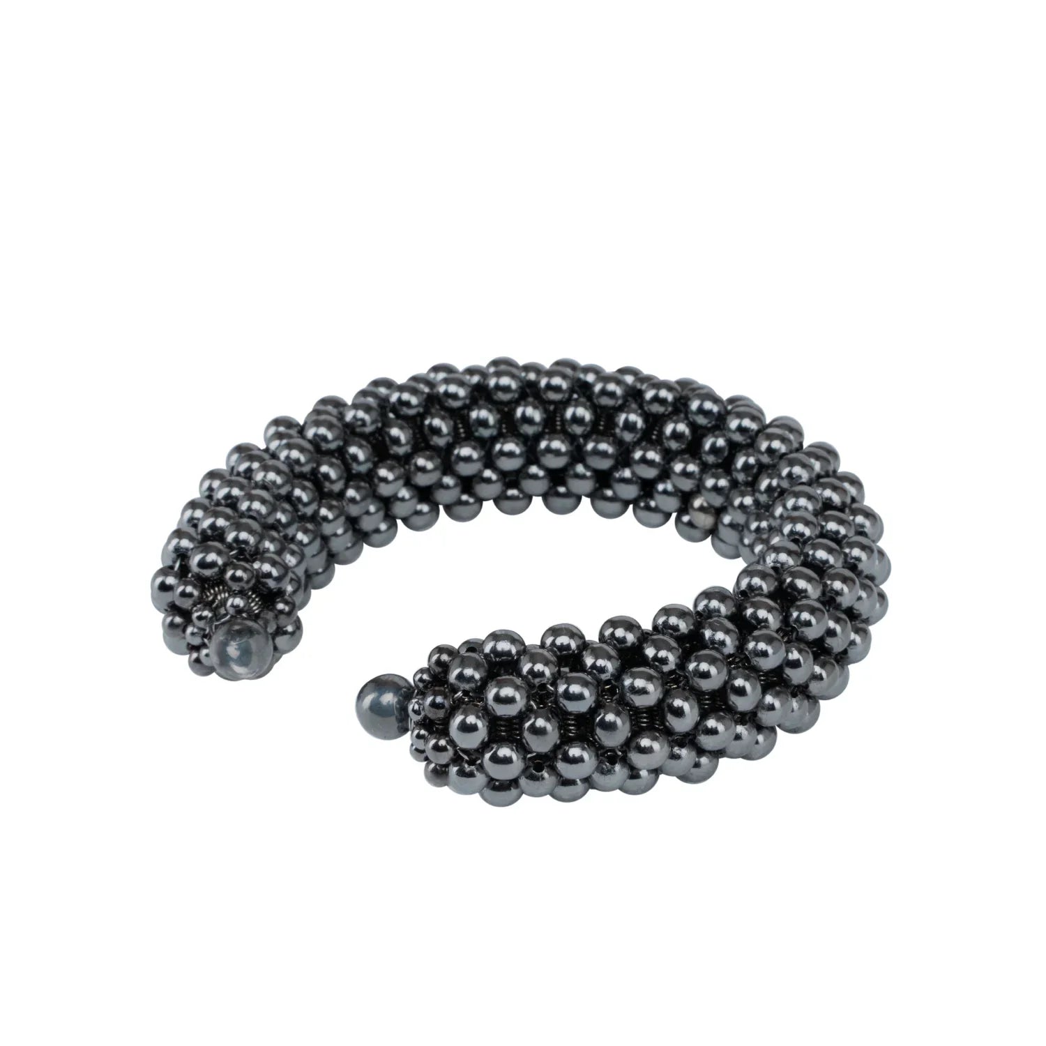 modular beaded wrist accessory in ivory, structured supple cuff with polymer metal beads, ghost image diagonal view by Object and dawn