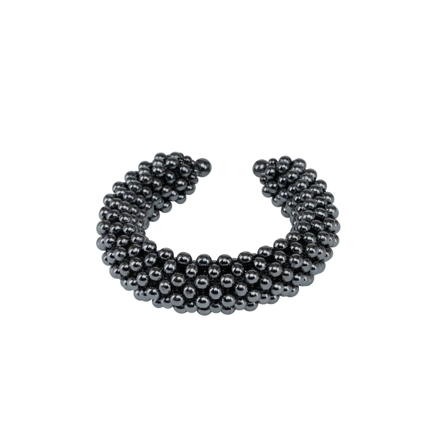 modular beaded wrist accessory in ivory, structured supple cuff with polymer metal beads, ghost image front view