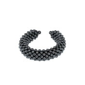 modular beaded wrist accessory in ivory, structured supple cuff with polymer metal beads, ghost image front view