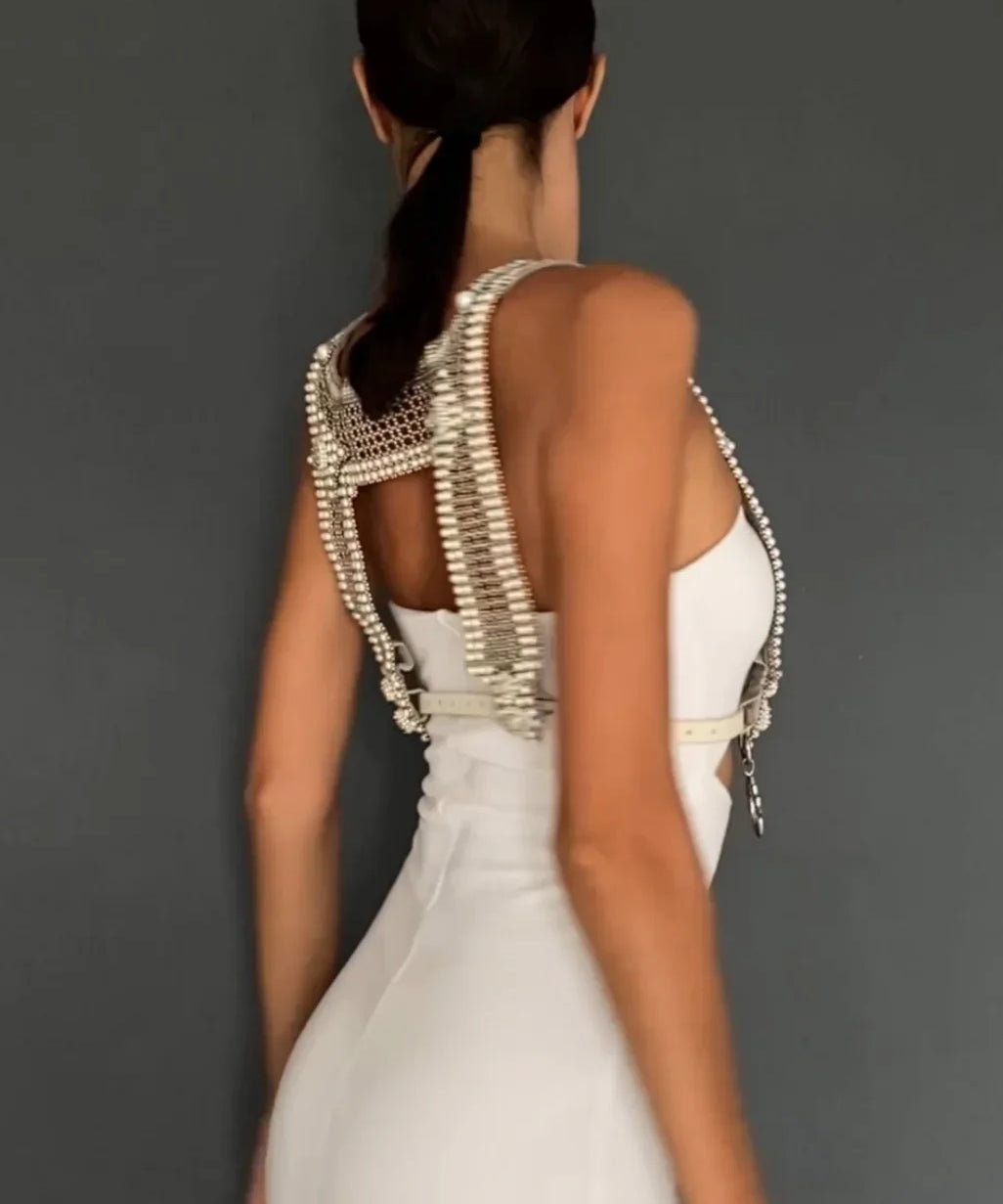 woman in white outfit wear artemisia mesh top in pearl with grey background