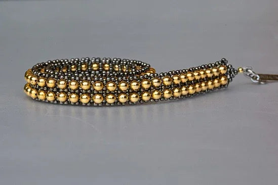 Handmade beaded polymer metal beads with 22k gold washed by object and dawn close up