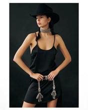 woman in dark grey background with handcrafted celestial choker and modular teuta belt silver