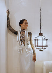 Woman wear Dietrich Leather Tuxedo Vest with Tamoe Silk Harness Skirt in white by Object & Dawn , modern bridal fashion, front view