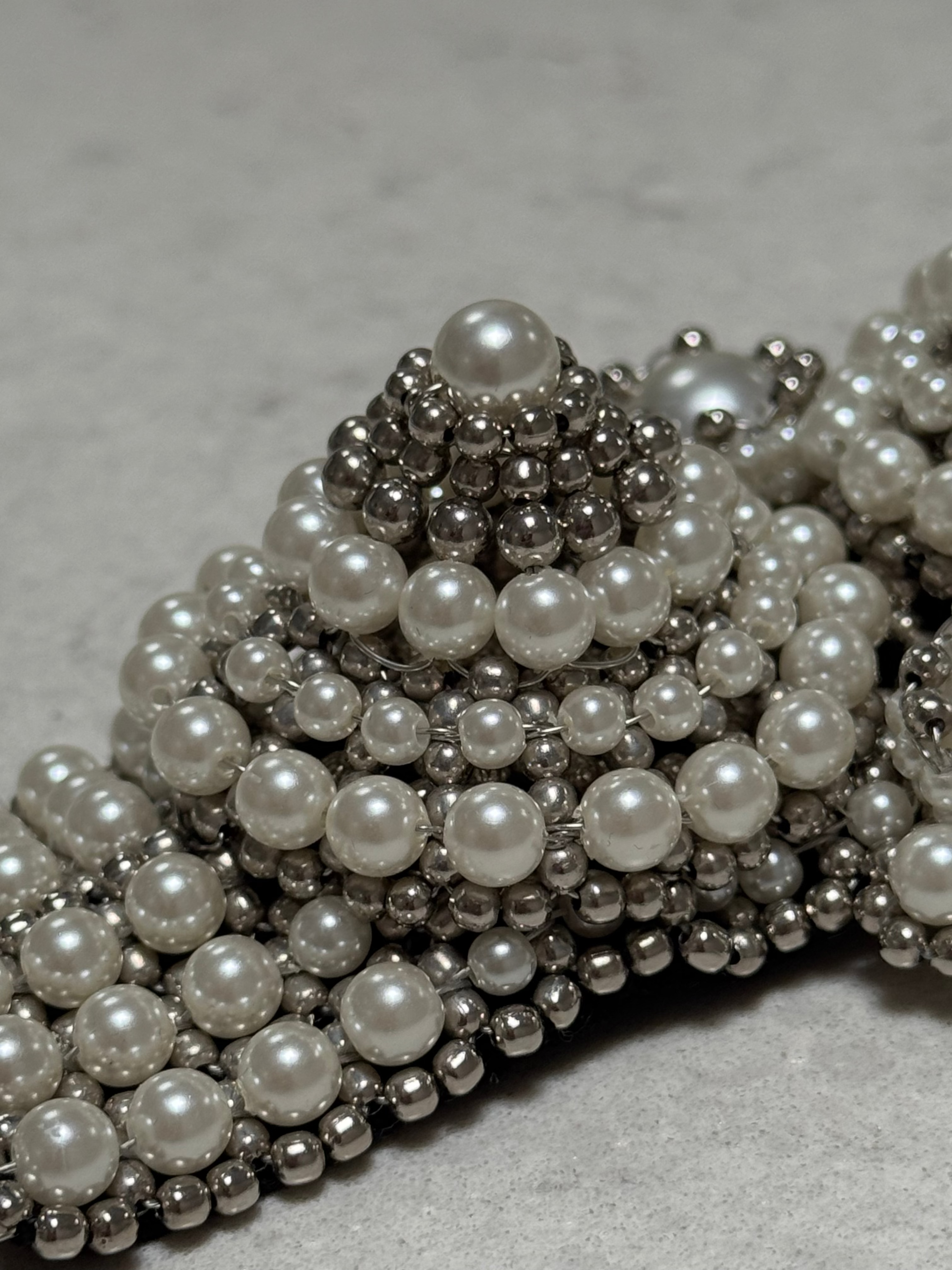 beaded detail of eingana modular crown in pearl with silver polymer beads by object and dawn close up