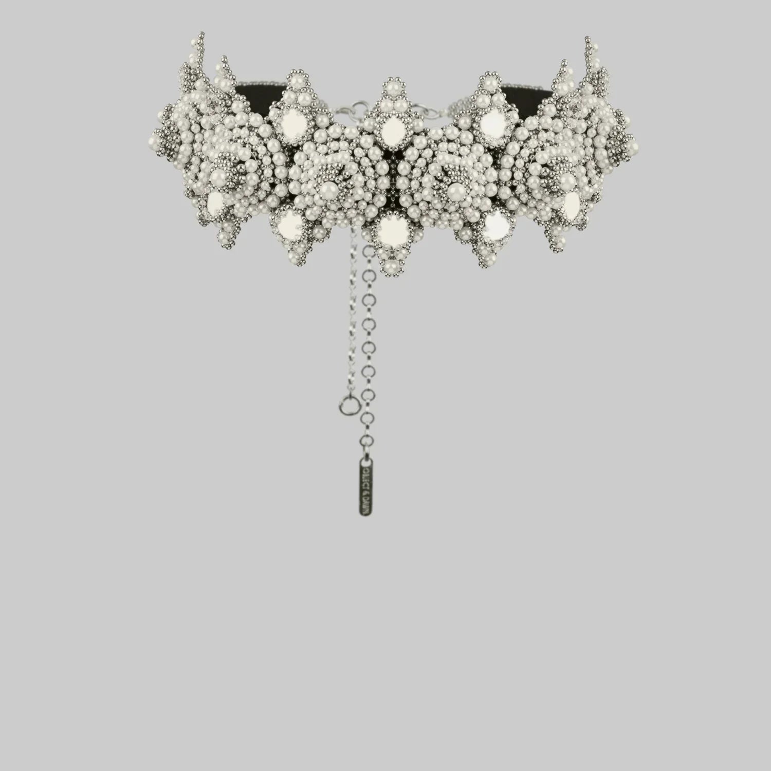 handcrafted modular crown by object and dawn ghost image  in grey background