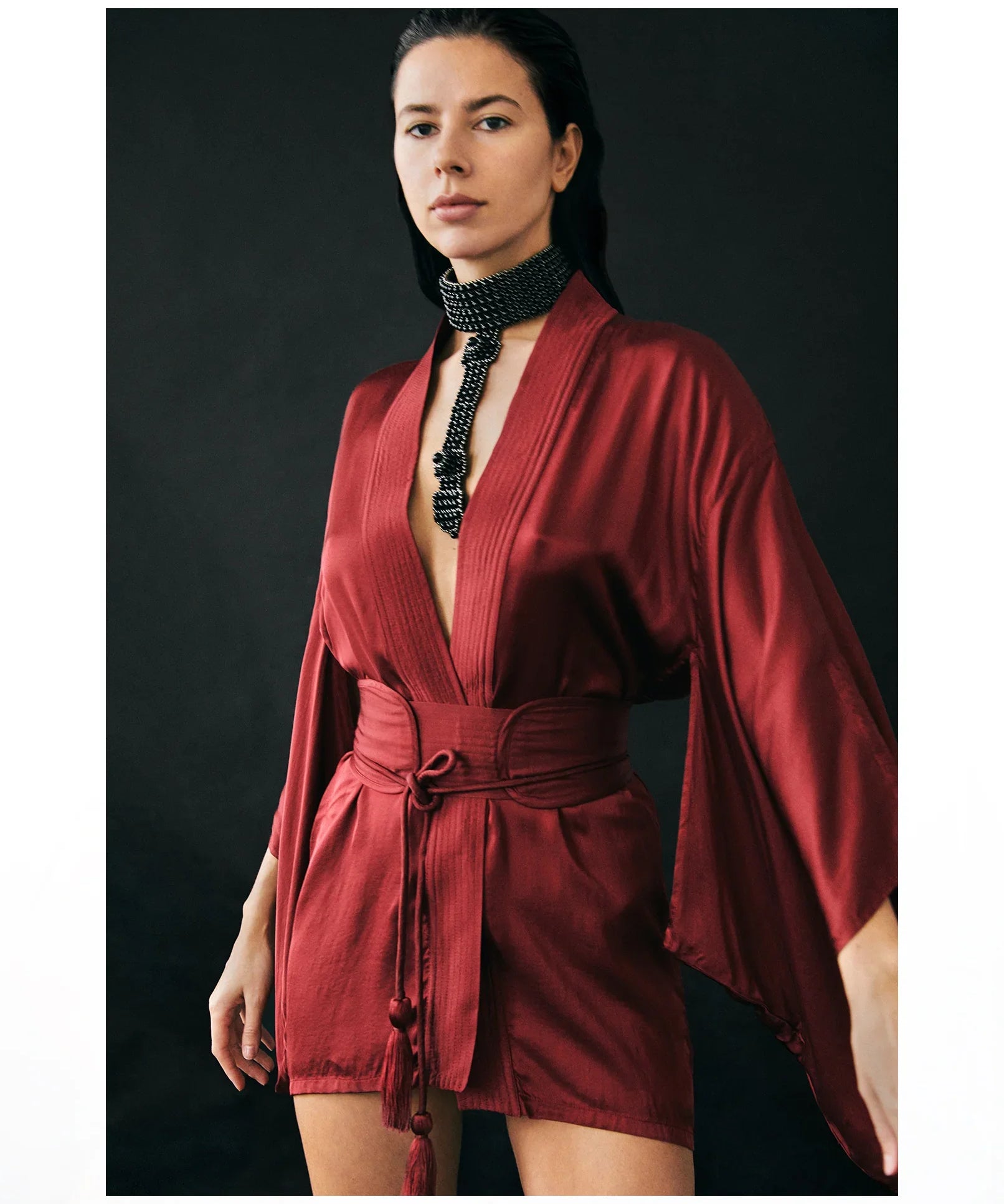 Object & Dawn Elohim T-Choker jet blackwith Mineko Short SIlk Kimono burgundy worn by woman in black background