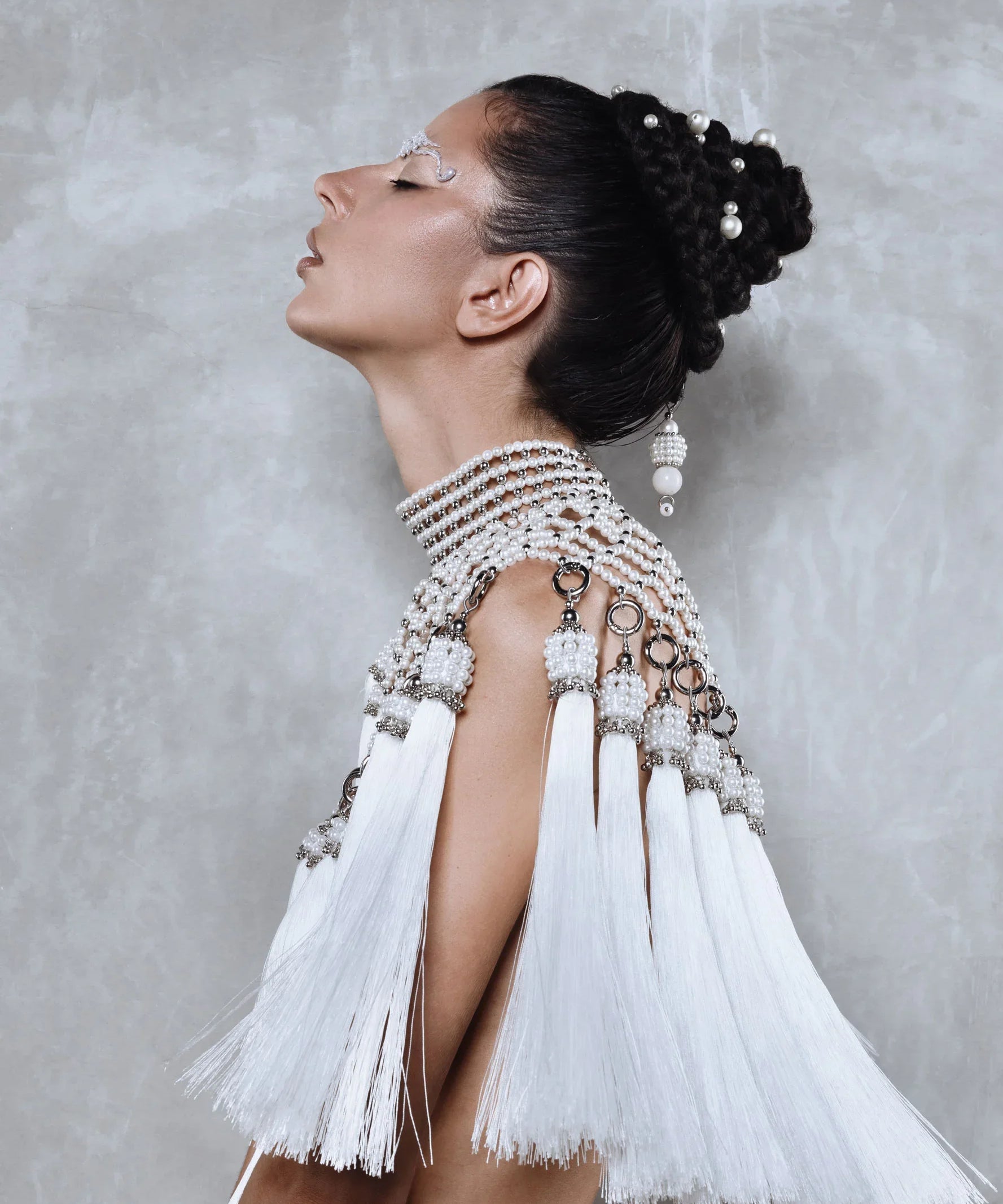 Freja_Modular_Cape_in_Pearl_with_Medallions_by_Object_Dawn_model_Marina_left_side.jpg