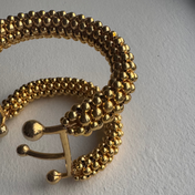 Hera Beaded Cuff Gold by Object & Dawn on a white backgorund front view, ghost image close up detail