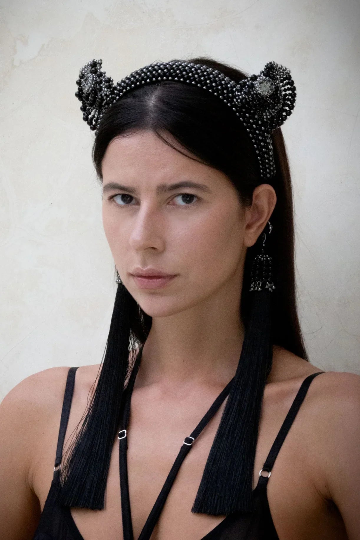 Object & Dawn, Jas headband in jet black worn by woman in black outfit in neutral background