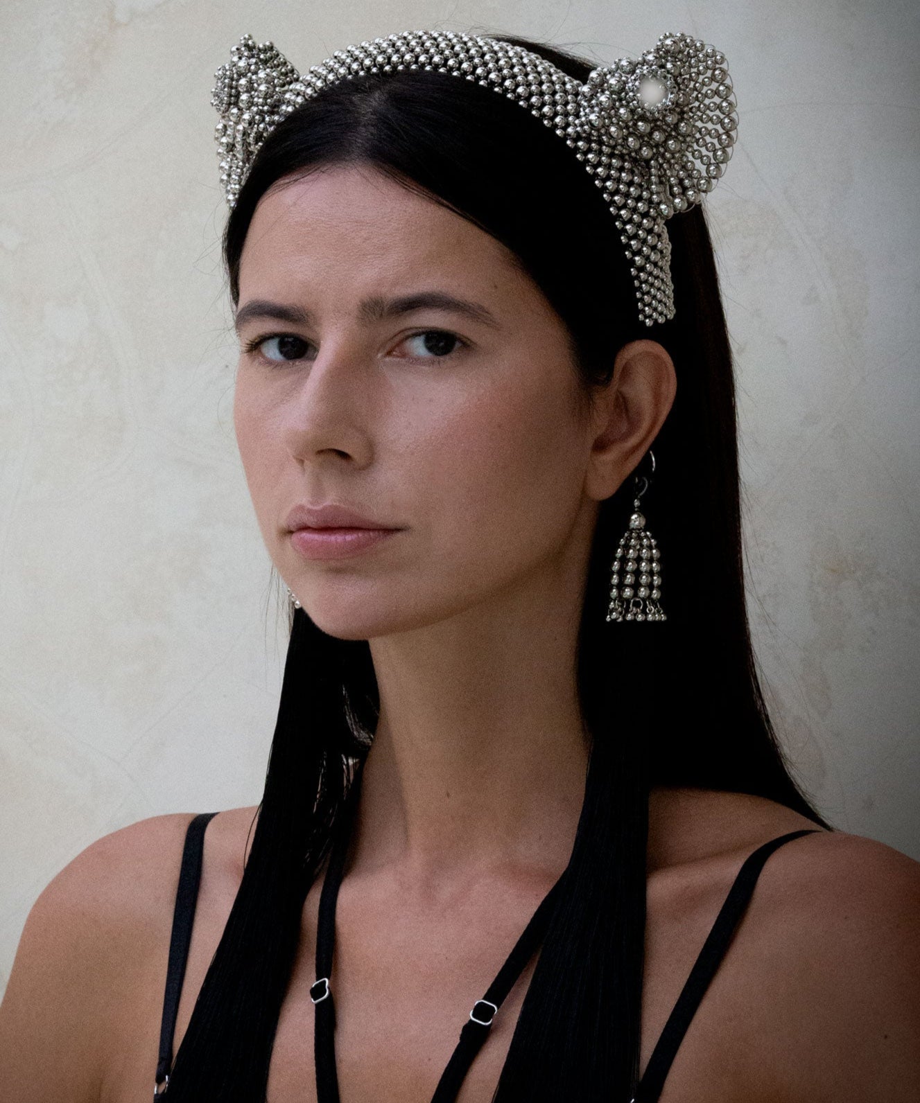 jas headband in silver by Object & Dawn worn by woman in black outfit