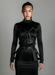 Woman wearing a black outfit with Jas Leather Cage Skirt and Cage Top on a gray background by Object & Dawn