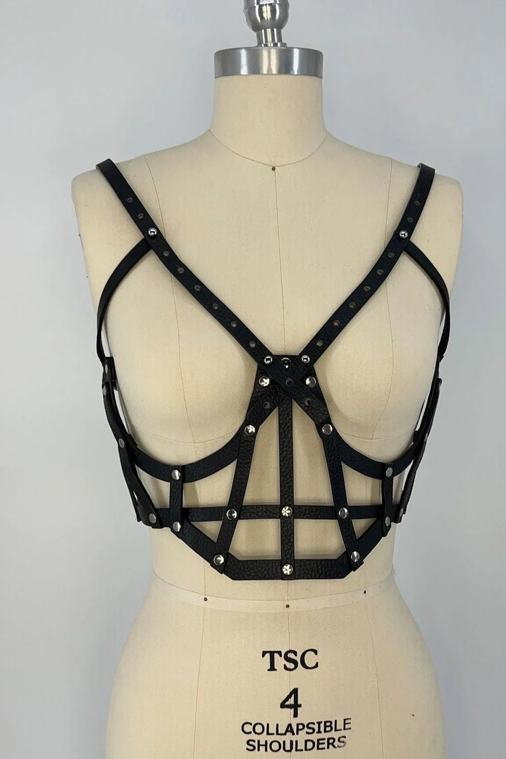 beaded premium leather Jas Studded Cage top by object and dawn on mannequin in white background