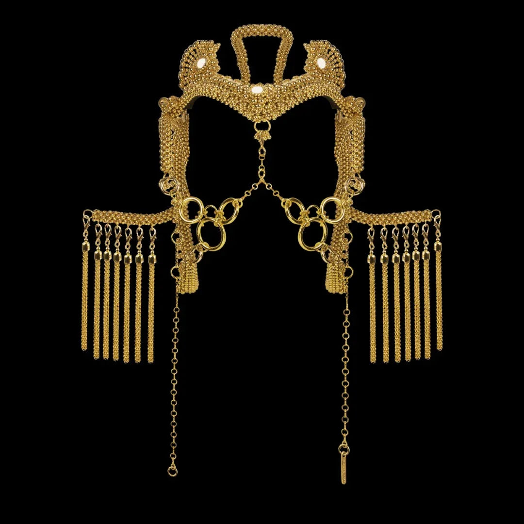 object and dawn jas headpiece system in gold by object and dawn in black background