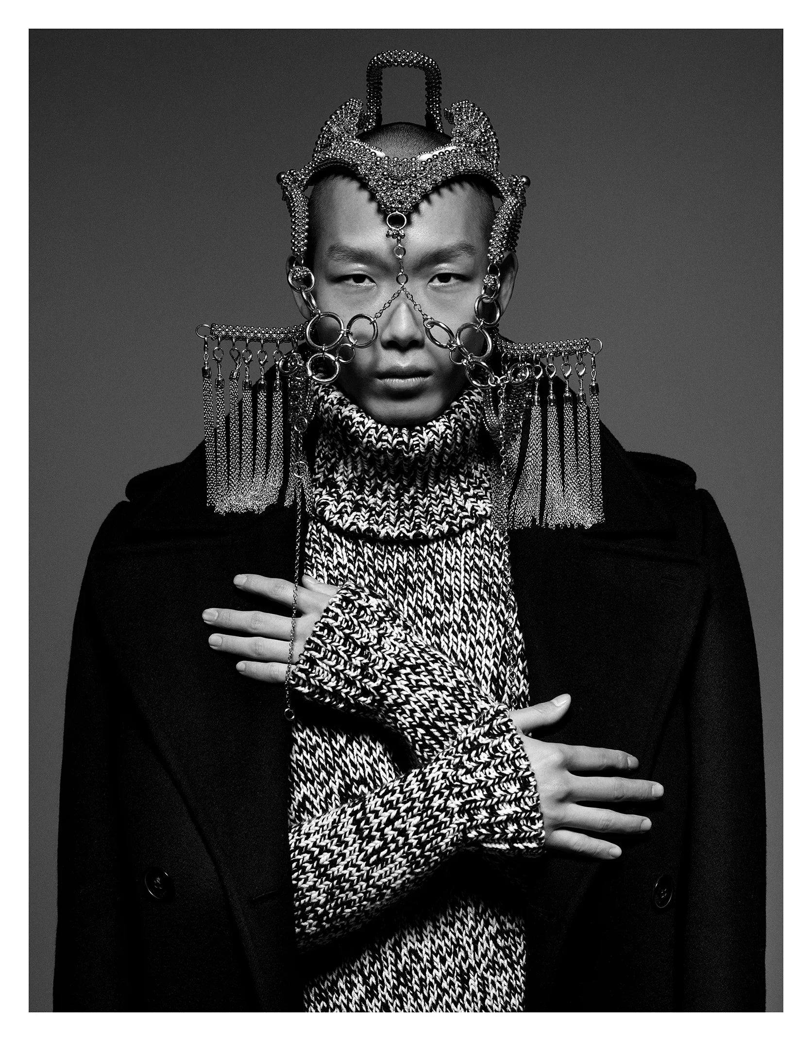 man with modular headpiece system in silver with grey sweater and black coat by object and dawn