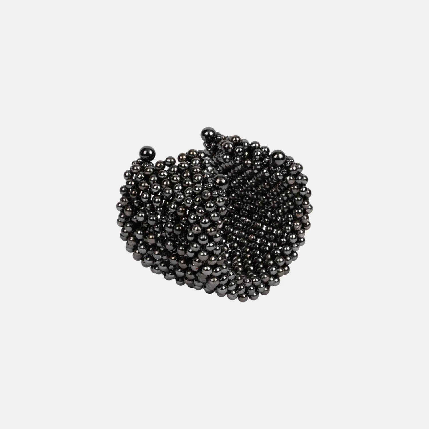 handcrafted polymer metal beads grey Khutulun 4D Supple Cuff from object and dawn diagonal view ghost image