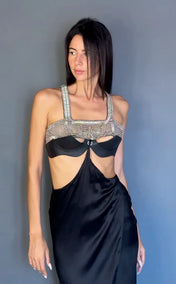 woman wears beaded modular top with premium leather and silk harness skirt black by object and dawn
