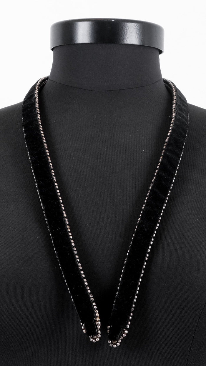 close-up of velvet lining with handcrafted beaded detail on luxury x beaded harness