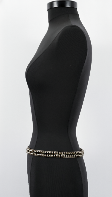 Black Mannequeen with Modular Beaded Belt by OBject & Dawn against a white background