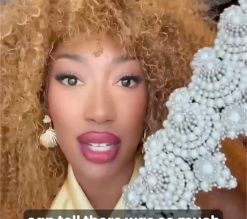 A woman bride is holding the Eingana Crown in pearl color with Subtitle &quot;can tell there was so much love&quot; 