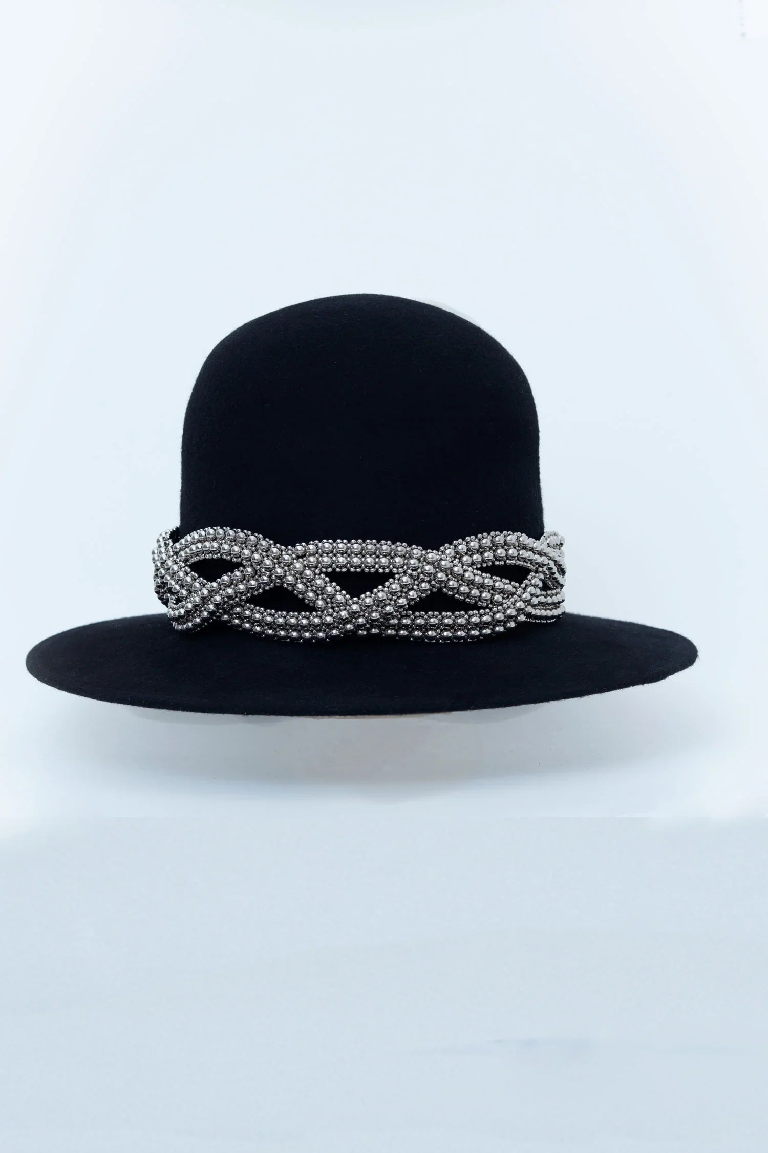 Object & Dawn Beaded modular hat accessory from polymer metal beads on neutral background