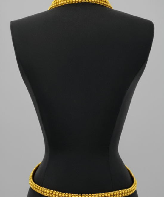 Mannequin wearing a X-Shape Harness Necklace by Object & Dawn against a gray background.