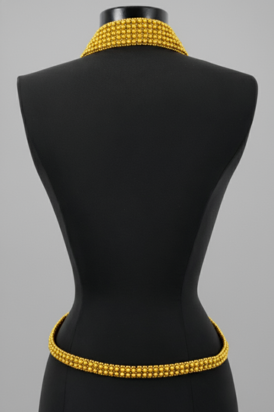 Mannequin wearing a X-Shape Harness Necklace by Object & Dawn against a gray background.