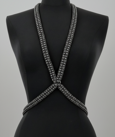 X-Shape Harness Necklaceon a mannequin against a gray background by Object & Dawn