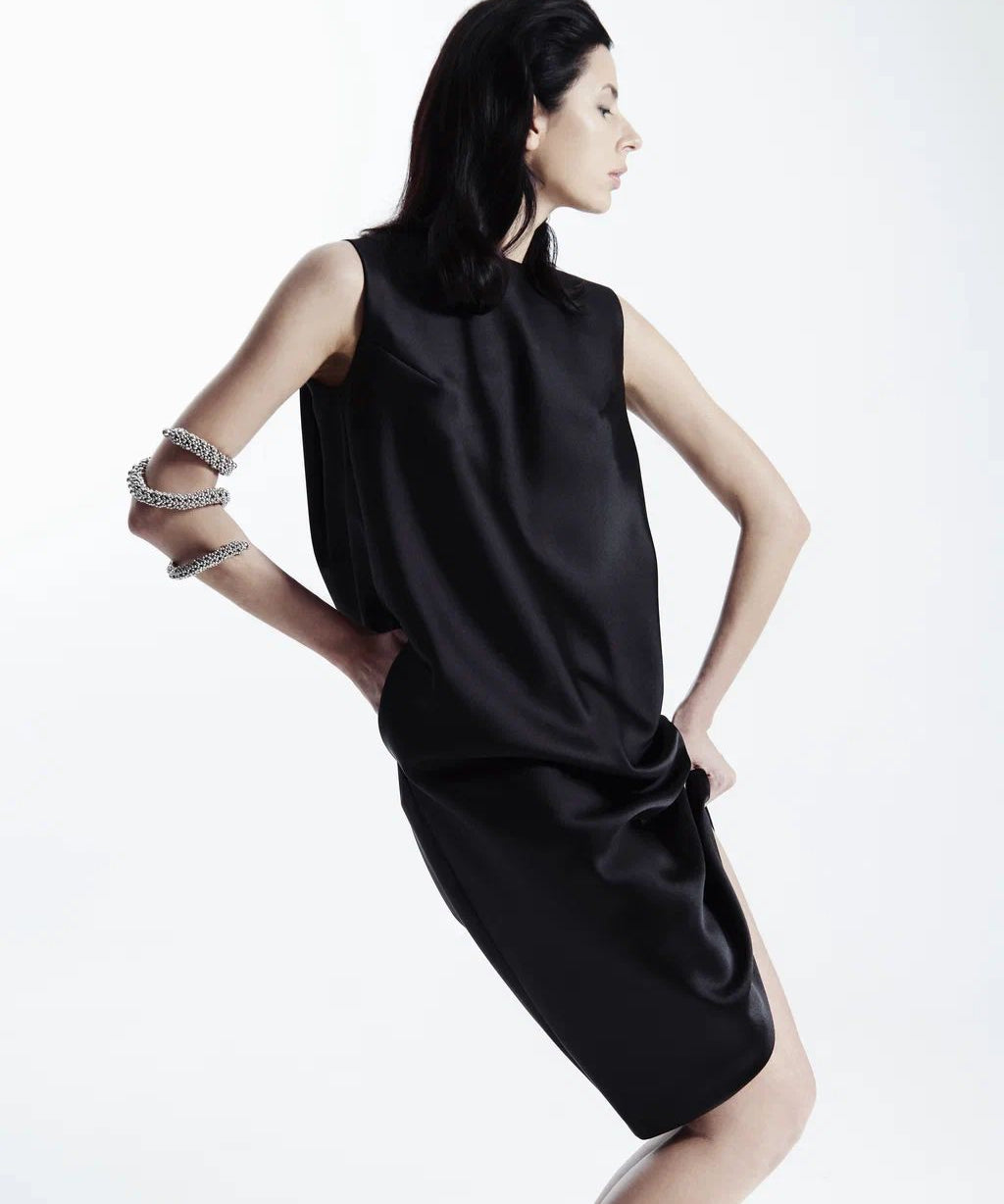 Woman in black outfit wear Zetian Beaded Spiral Cuff silver by Object&Dawn