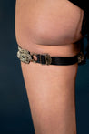 Amaya Garter Band by Object and Dawn. Power is sexy. You'll feel both wearing this one.   Our skilled artisans use an ancient and disappearing technique to construct your piece. Made with high quality metal beads that are coated in polymer to preserve shine and ensure the item is hypoallergenic. The garter band is fully lined by hand in luxurious velvet and has an adjustable elastic strap to comfortably fit to your thigh circumference.