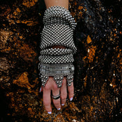 Object & Dawn beaded wrist accessory in ivory, structured supple cuff with polymer metal beads, ghost image