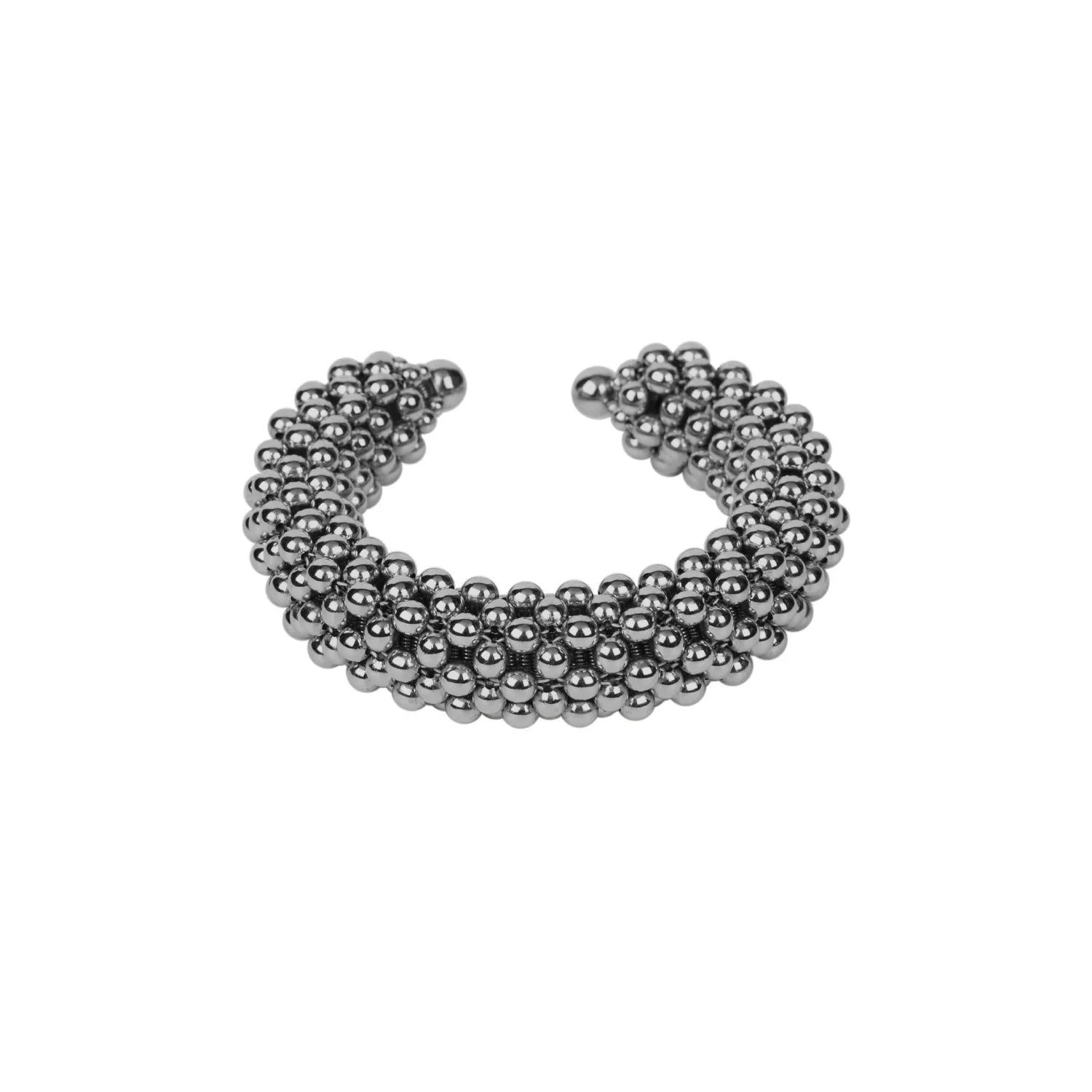 Object & Dawn beaded wrist accessory in ivory, structured supple cuff with polymer metal beads, ghost image front view