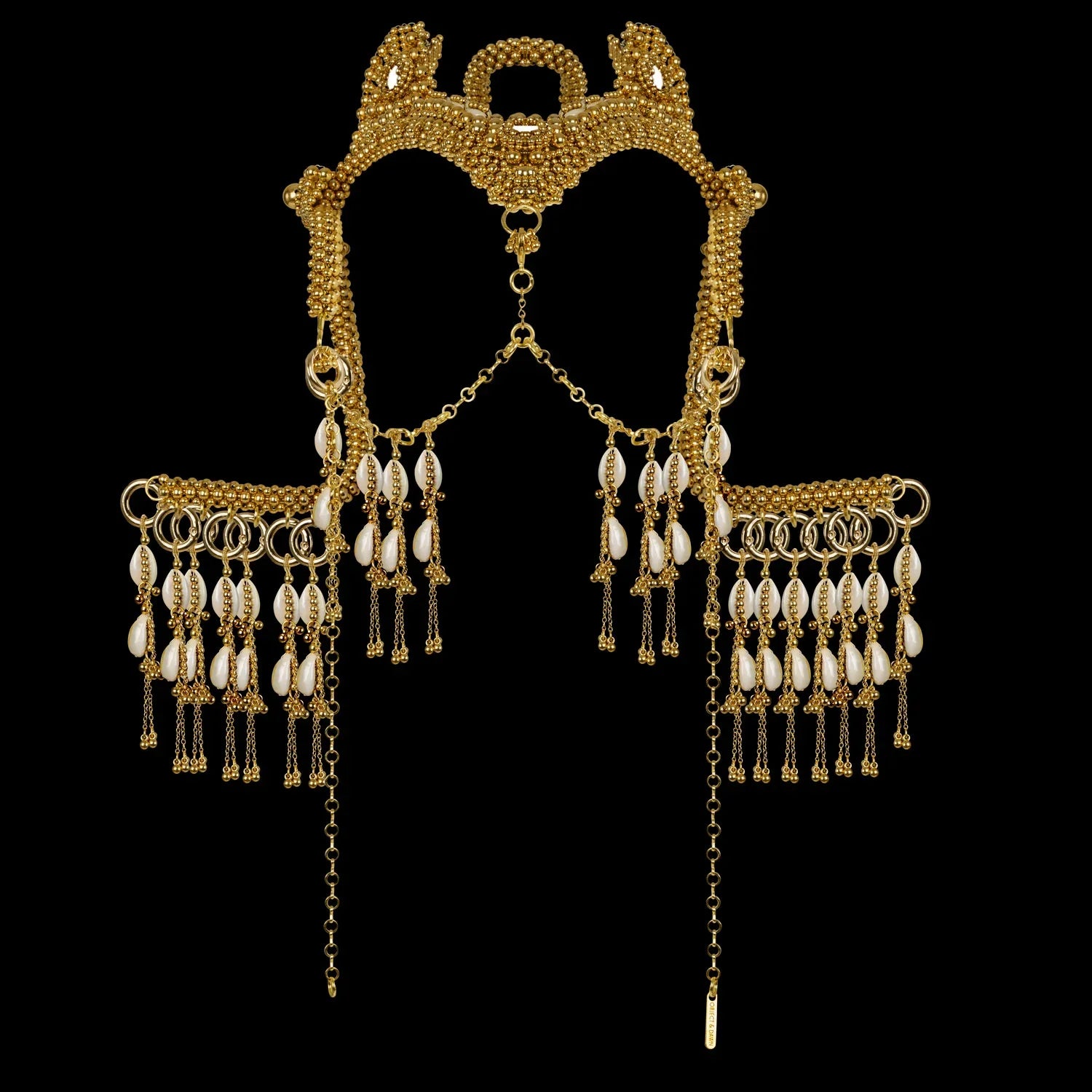 modular beaded jas headpiece system from 22 gold washed metal beads with shell tassels from object and dawn in black background