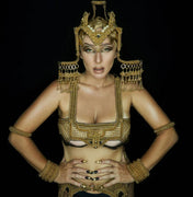 woman in gold beaded harness top with leather bra from 22k gold wash on each metal beads by object and dawn