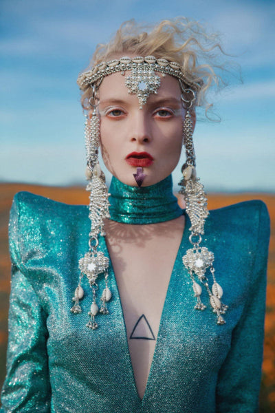 blond woman wearing Rushi Modular Headpiece System by Object & Dawn. A silver beaded crown with side panels that hang to the woman's chest.