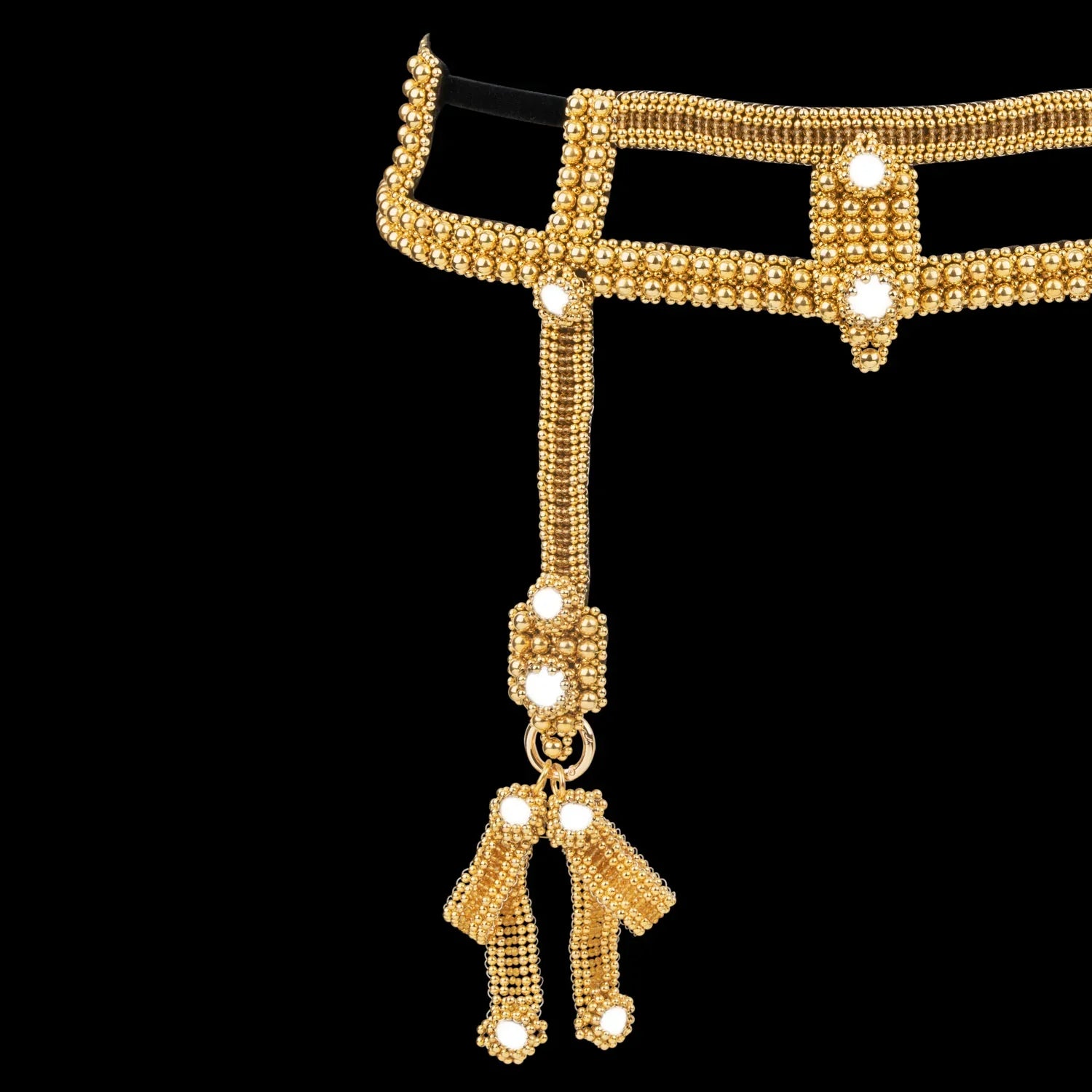 close up Object and Dawn Teuta modular belt with amaya bow gold ghost image in black background front view 