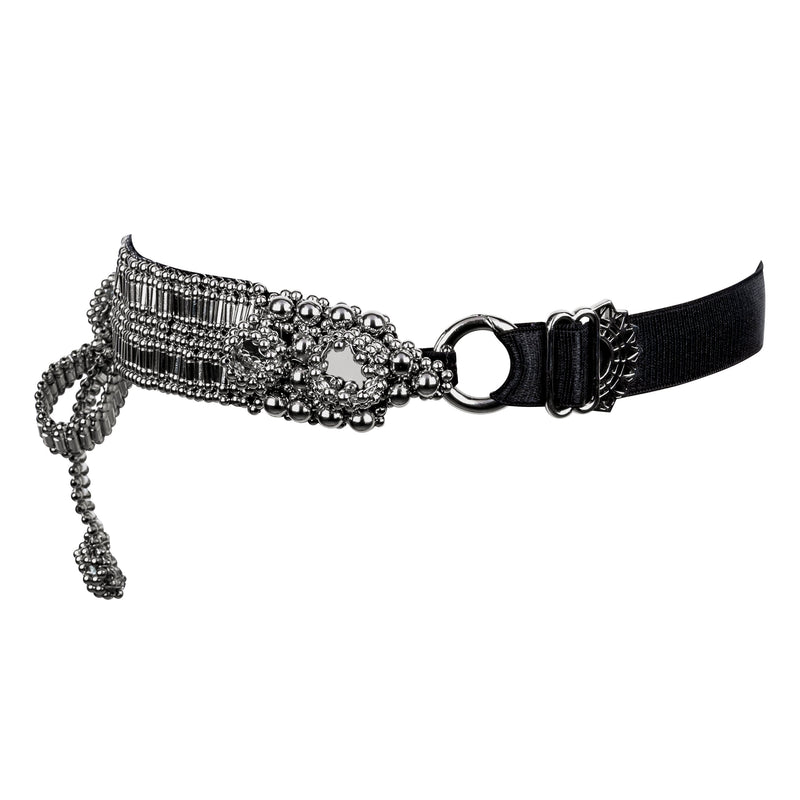 Amaya Garter Band by Object and Dawn. Power is sexy. You'll feel both wearing this one.   Our skilled artisans use an ancient and disappearing technique to construct your piece. Made with high quality metal beads that are coated in polymer to preserve shine and ensure the item is hypoallergenic. The garter band is fully lined by hand in luxurious velvet and has an adjustable elastic strap to comfortably fit to your thigh circumference.