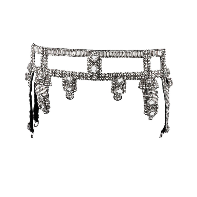 Amaya Modular Garter Belt by Object and Dawn is constructed entirely by hand with high quality metal beads that coated in polymer to preserve shine and ensure the item is hypoallergenic. The belt is detailed with hand cut mirror clusters and fully lined by hand in luxurious velvet for your ultimate comfort.  Ethically made by a team of our skilled in house artisans, with ancient techniques.