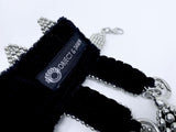 Eingana Choker with Removable Tassels by Object and Dawn is constructed entirely by hand with high quality metal beads that coated in polymer to preserve shine and ensure the item is hypoallergenic.  Ethically made with secret ancient techniques by our skilled artisans.  Accented with removable black polyester tassels. Fully lined in velvet for your ultimate comfort.