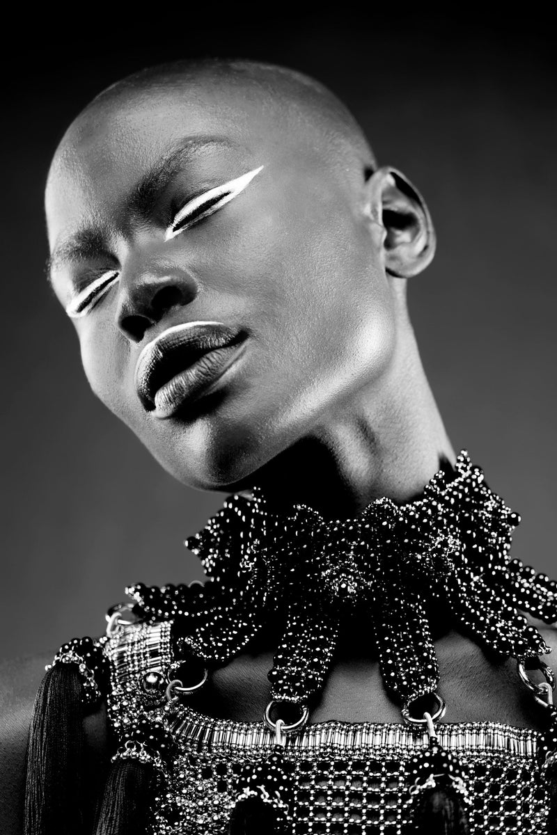 Eingana Choker with Removable Tassels by Object and Dawn is constructed entirely by hand with intricate black glass beads and high-quality, gunmetal-plated brass beads that are coated in polymer to preserve shine and ensure the item is hypoallergenic.  Ethically made with secret ancient techniques by our skilled artisans.  Fully lined in velvet for your ultimate comfort.