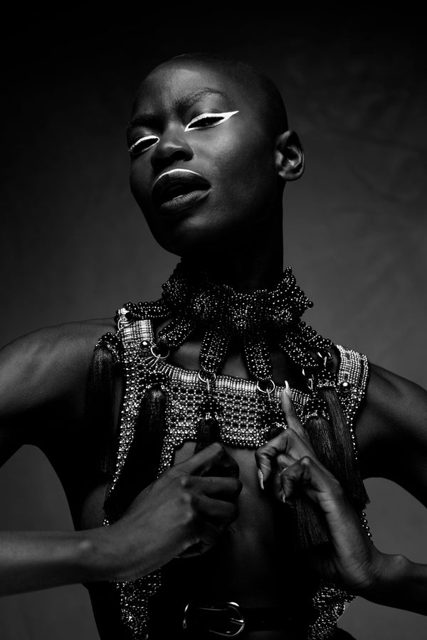 Eingana Choker with Removable Tassels by Object and Dawn is constructed entirely by hand with intricate black glass beads and high-quality, gunmetal-plated brass beads that are coated in polymer to preserve shine and ensure the item is hypoallergenic.  Ethically made with secret ancient techniques by our skilled artisans.  Fully lined in velvet for your ultimate comfort.