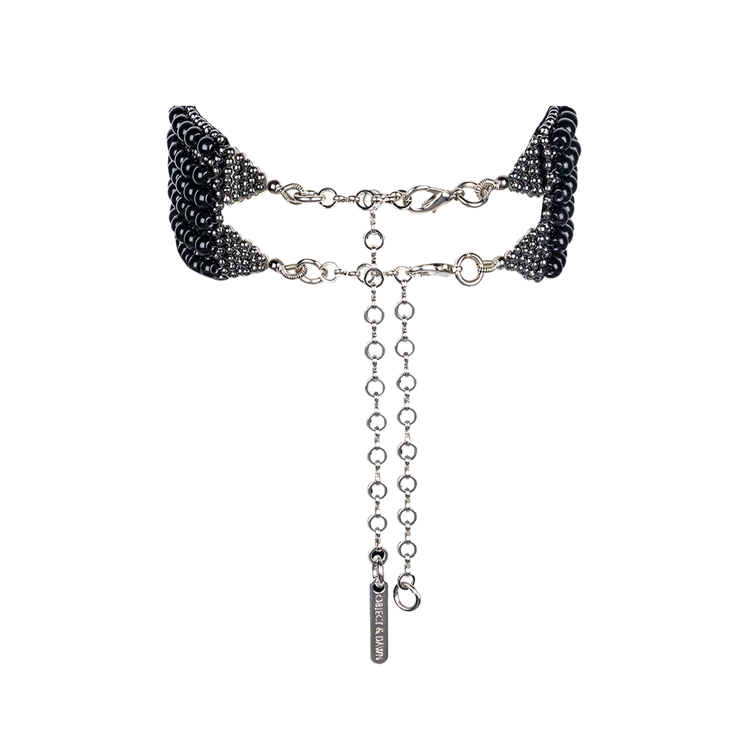 Elohim T-Choker by Object and Dawn constructed entirely by hand with intricate black glass beads and high-quality, gunmetal-plated brass beads that are coated in polymer to preserve shine and ensure the item is hypoallergenic.  Ethically made with secret ancient techniques by our skilled artisans, each piece takes several days to make. Fully lined by hand in velvet for your ultimate comfort.